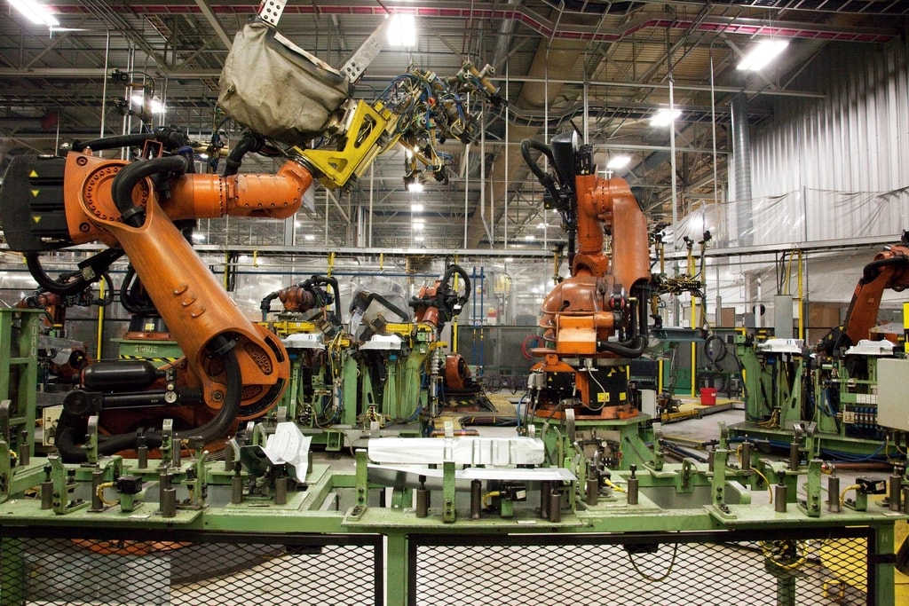 Industrial assembly line with robotic arms.